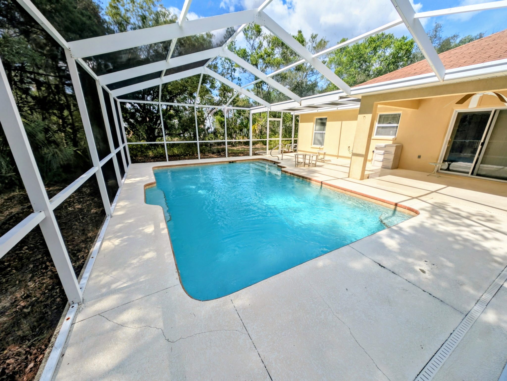 Clean pool deck and screen enclosure